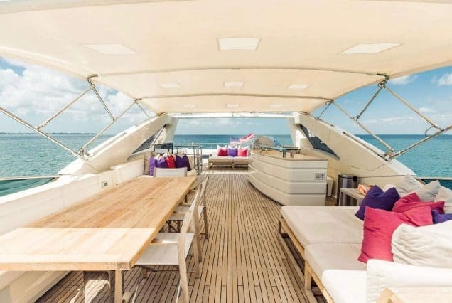 Luxury 110ft Dominator Senay Miami flybridge with bar setup and social gathering space