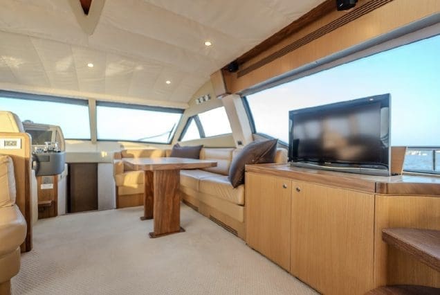 68ft Ferretti Yacht interior dining area ideal for meals and celebrations.