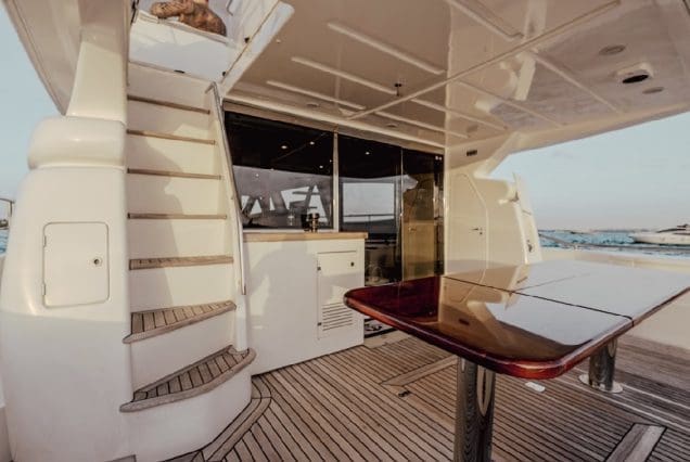 68ft Ferretti Yacht boarding area with steps leading to upper deck.