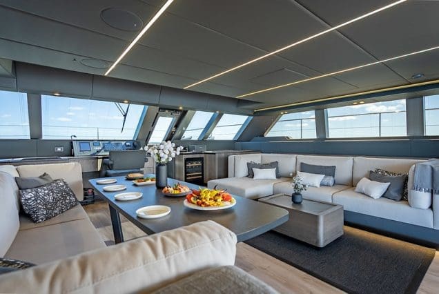 Sunreef 70ft ARCHIPIELAGO Miami luxury lounge with table for refined social gatherings