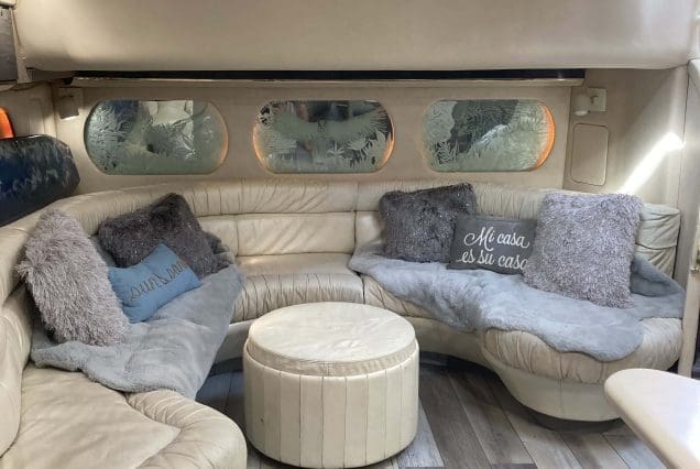 70ft Sea Ray Outrage Miami stylish lounge with table for social gatherings
