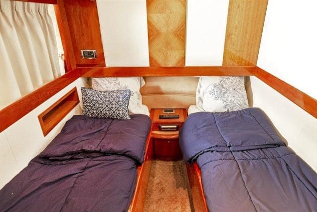 Warrior 65ft Aicon Miami guest cabin with refined interiors and comfortable sleeping space