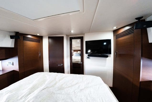 SAIL LA VIE 50ft Sea Ray Miami spacious master bedroom designed for a relaxing stay with TV