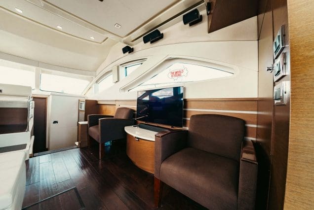 SAIL LA VIE 50ft Sea Ray Miami modern lounge with table for entertainment and TV