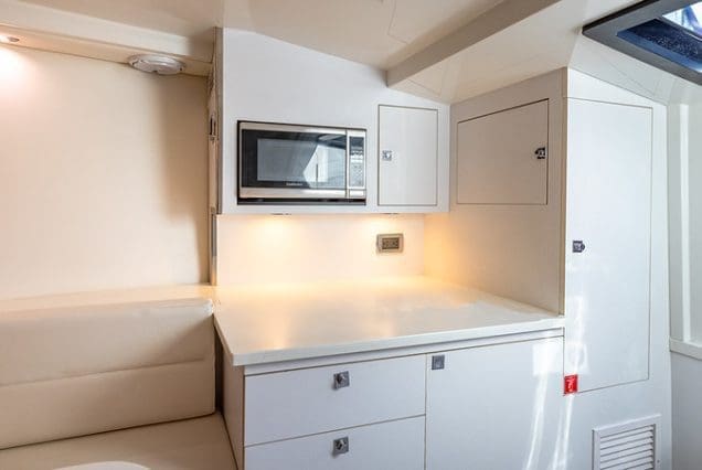 Luxury 40ft Van Dutch Miami compact galley with high-end finishes