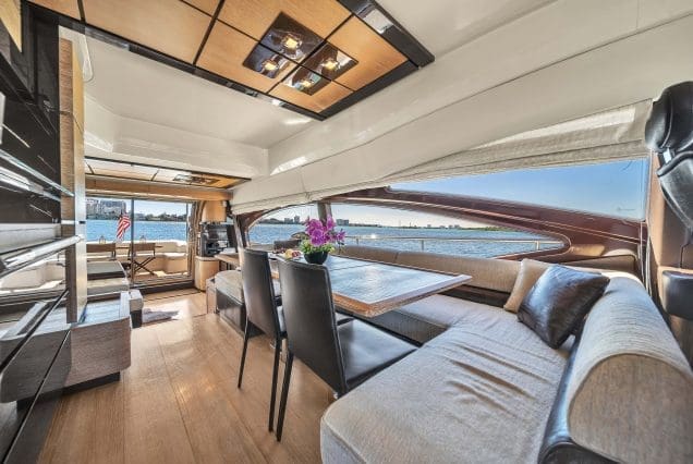 Luxury 70ft Azimut Miami sophisticated indoor salon with plush seating and contemporary décor