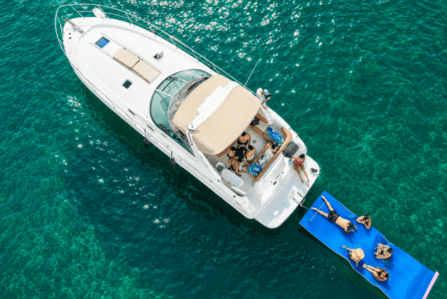 45ft Sea Ray Lux Miami bow lounge area with stunning views of Biscayne Bay and the Miami skyline