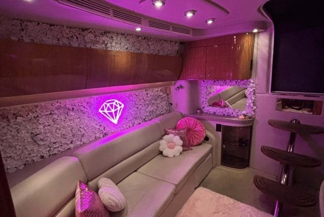 45ft Diamond Pink Miami elegant indoor salon with plush seating and modern décor