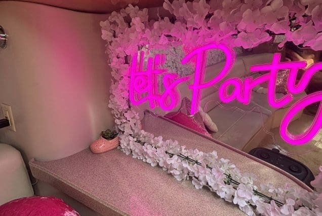 45ft Diamond Pink Miami elegant indoor salon with plush seating and modern décor