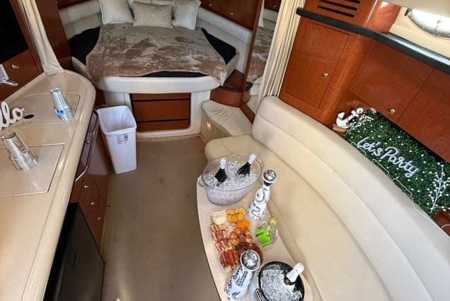 37ft Sea Ray E$Z Miami welcoming indoor salon with comfortable seating and modern styling