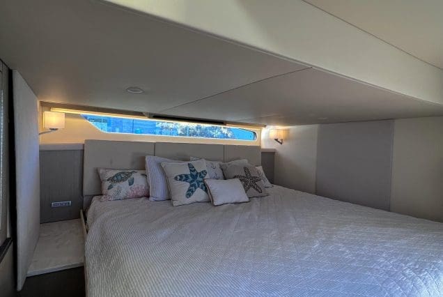 45ft Regal Model 2022 Miami guest cabin with modern interiors and comfortable sleeping accommodations