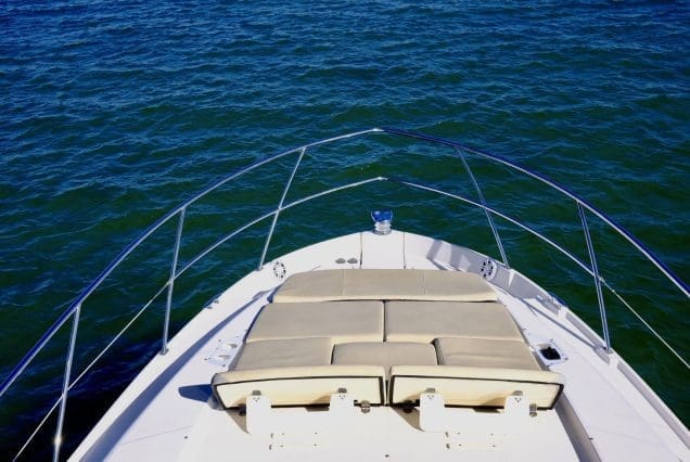 45ft Regal Model 2022 Miami bow lounge area with stunning views of Biscayne Bay and the Miami skyline