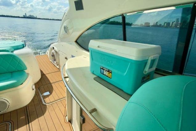 Luxury 60ft Tiffany Sunseeker Miami premium outdoor social area with cooler space and comfortable seating