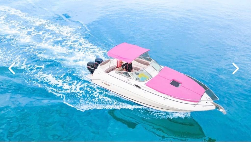 28FT PINK RINKER Miami stylish pink boat available for fun and affordable charter experiences