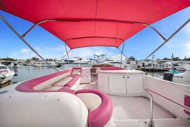 50ft Hello Kitty Pink Yacht Miami stylish outdoor social area with comfortable seating and cooler space